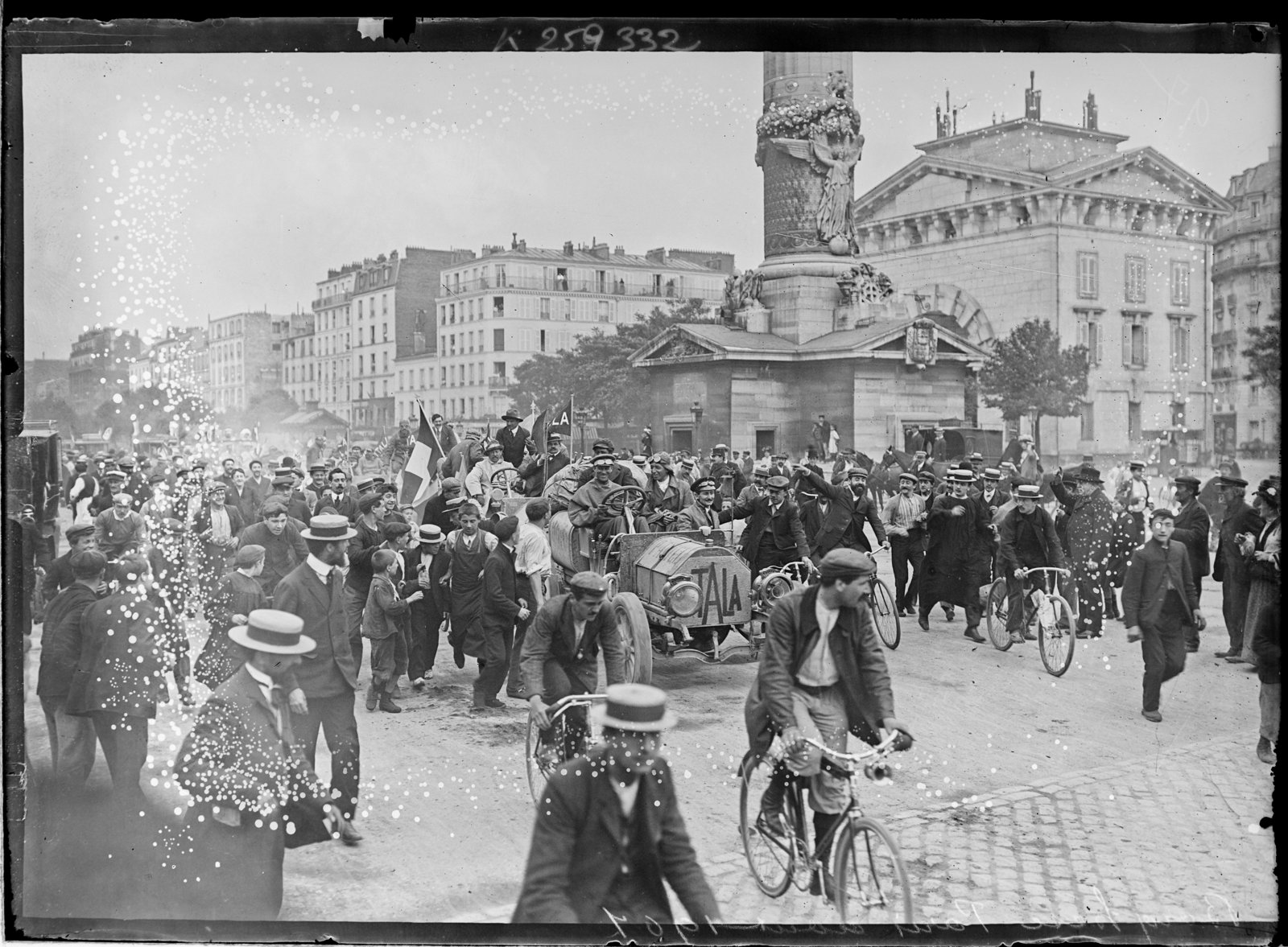 The Itala pushing through a crowd in Paris at the finish of the 1907 Peking to Paris race